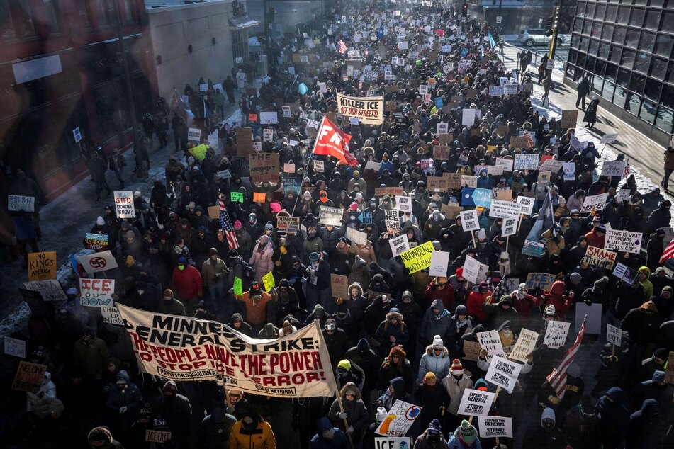 A crowd of protesters against ICE march through the streets of downtown Minneapolis, Minnesota, on January 25, 2026.