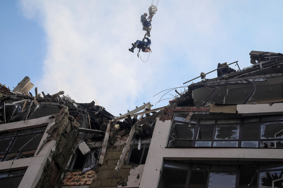 Ukraine war: Kyiv under attack again as missile hits residential building