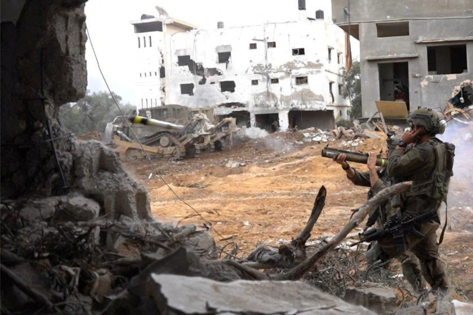 Israeli soldiers in the Gaza Strip amid the ongoing conflict between Israel and the Palestinian Islamist group Hamas.