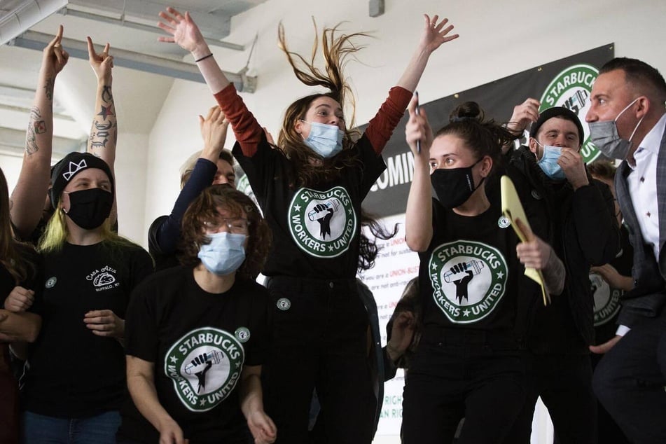 Starbucks workers in Buffalo, New York, celebrate winning their first union election in the United States.