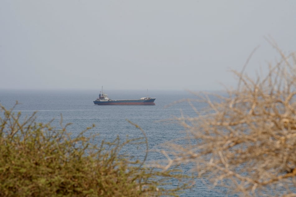 A vessel is pictured near the Strait of Hormuz, as seen from Musandam, Oman, on August 10, 2026.