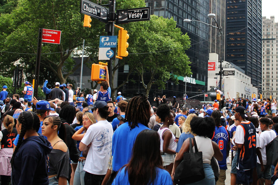 Lower Manhattan saw fans fill the streets, even in areas without a clear view of the action.