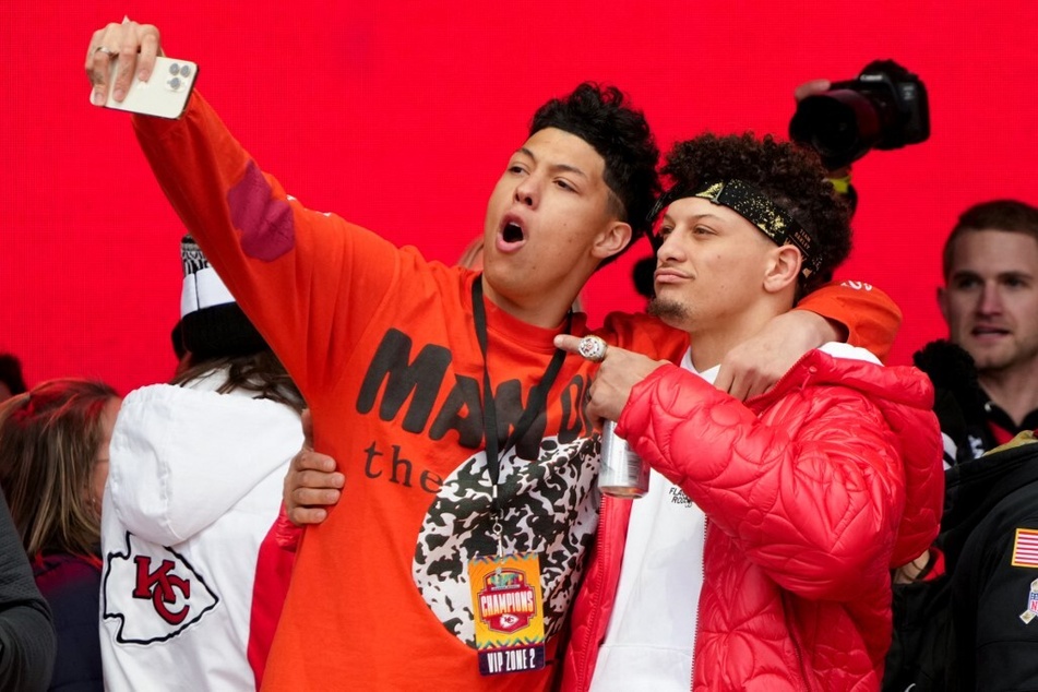 Jackson Mahomes (l) was arrested and booked on Wednesday on charges of aggravated sexual battery.