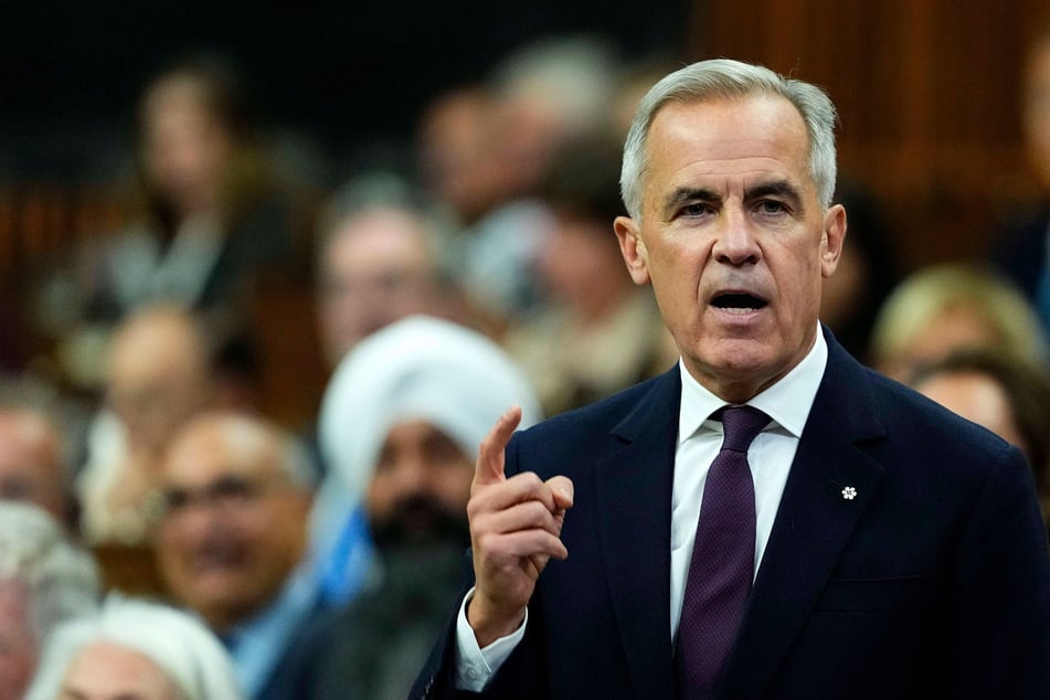 Canadian Prime Minister Mark Carney speaks during Question Period in the House of Commons on October 5. He has faced criticism for admitting his government has considered the possibility of a US invasion.