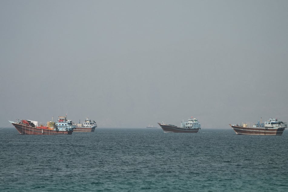 Vessels are pictured in the Strait of Hormuz, as seen from Musandam,Oman, on June 25, 2026.