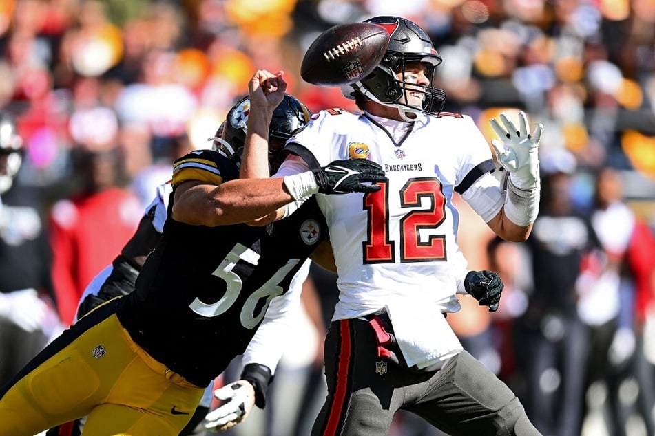 During Week 6 of the NFL season, Tampa Bay Buccaneers' Tom Brady loses his cool with his teammates after falling behind during the second quarter.