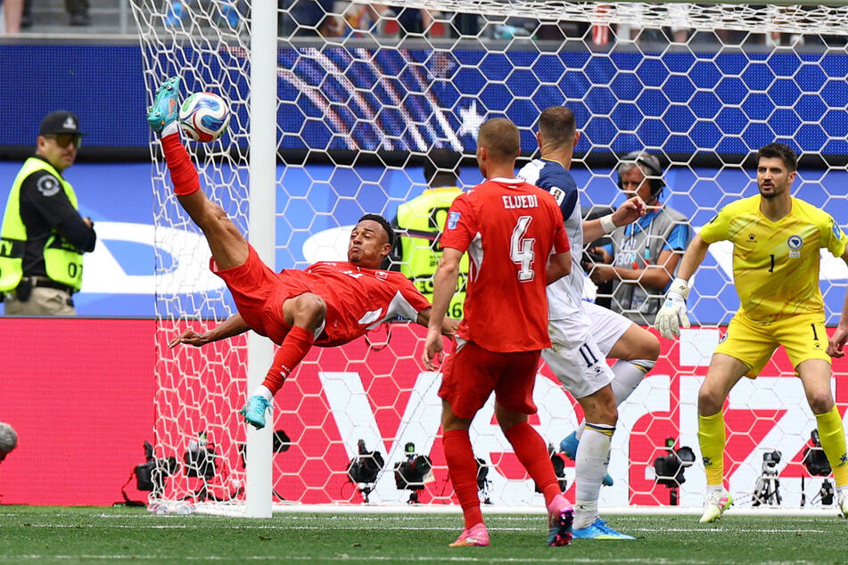 Switzerland's Dan Ndoye shoots at goal with an overhead kick during their World Cup Group B match against Bosnia and Herzegovina on June 18, 2026.