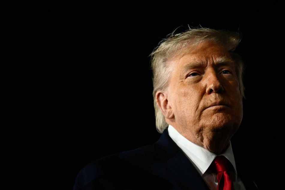 Trump vows to respond after accusing Iran of shooting down US helicopter