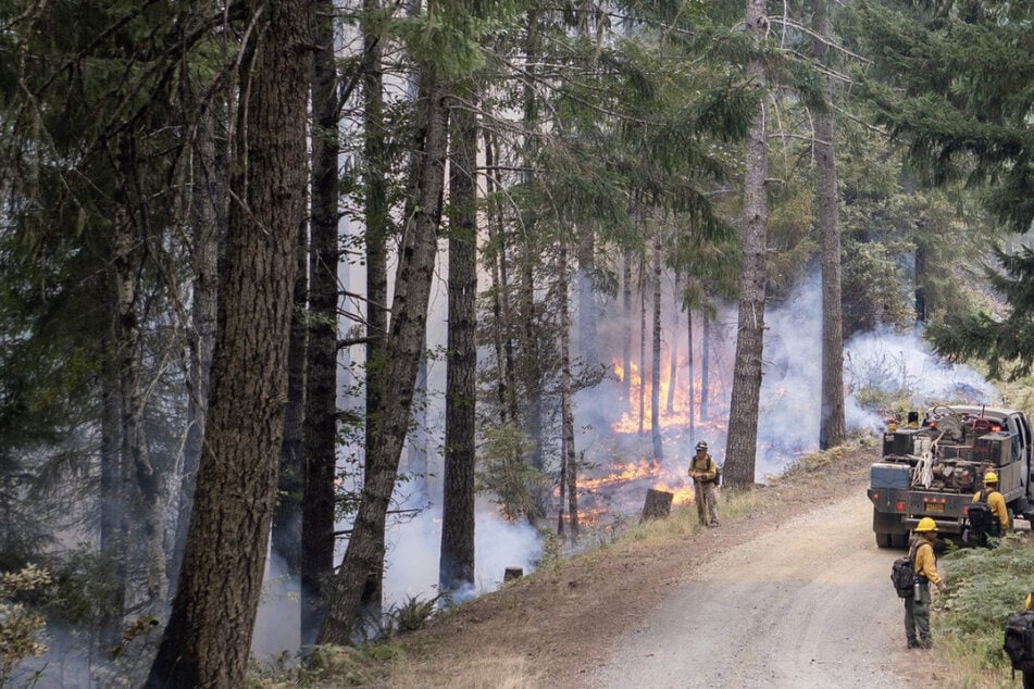 Smith River Complex wildfire raging on California-Oregon border leads to evacuations