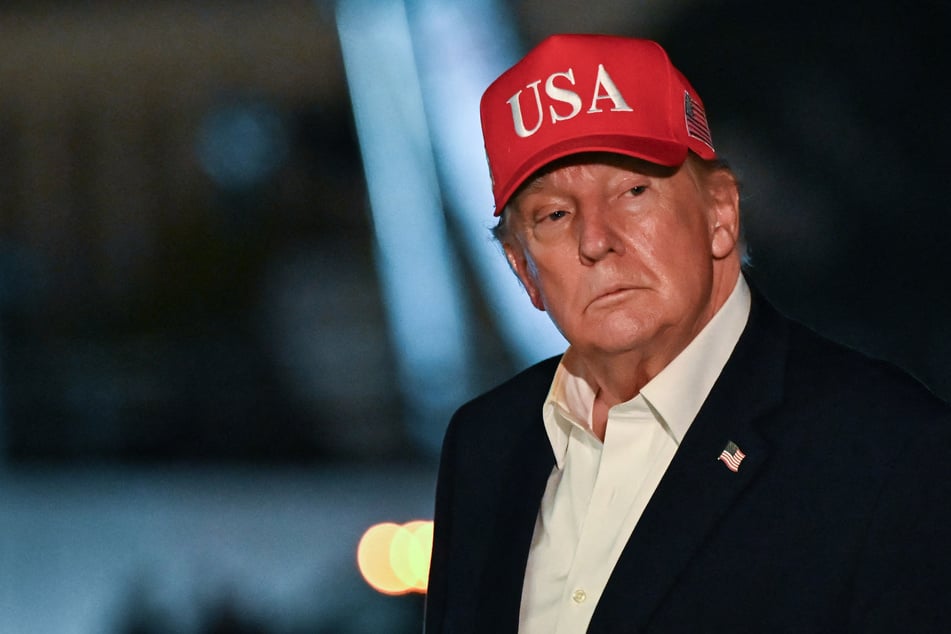 President Donald Trump gestures after arriving on Marine One on the South Lawn at the White House in the early hours of Thursday. Trump has now confirmed the execution of a convicted military base shooter will not be livestreamed as originnaly announced.