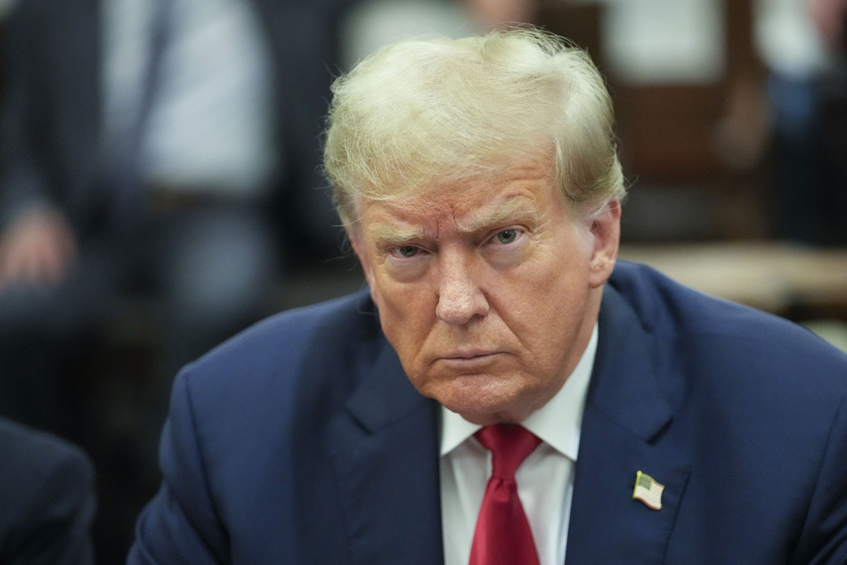 Donald Trump sits inside the courtroom for the third day of his civil fraud trial in New York on October 4, 2023.