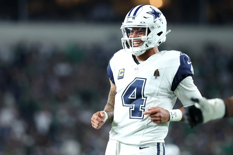 Dallas Cowboys quarterback Dak Prescott celebrates a touchdown during the first quarter against the Philadelphia Eagles at Lincoln Financial Field.