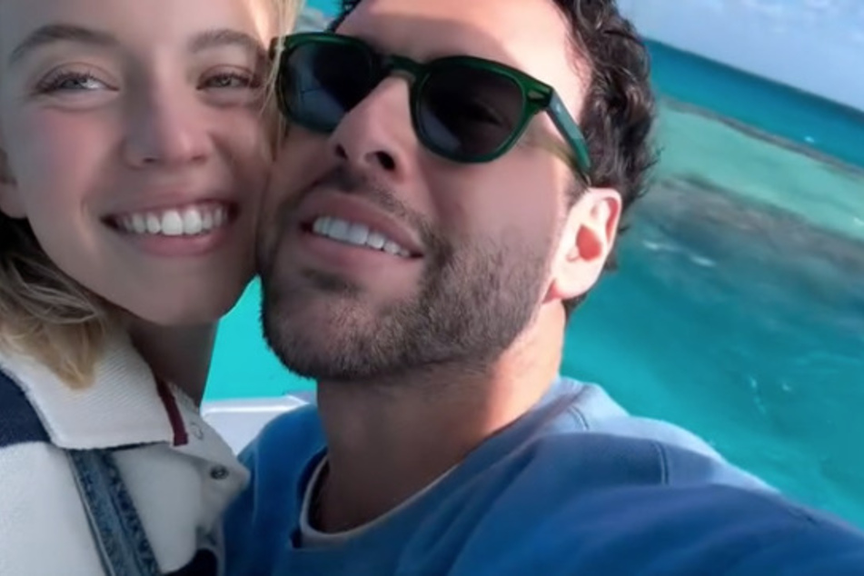 Sydney Sweeney and Scooter Braun (r.) took over Australia while the Euphoria star film's the live-action Gundam movie.
