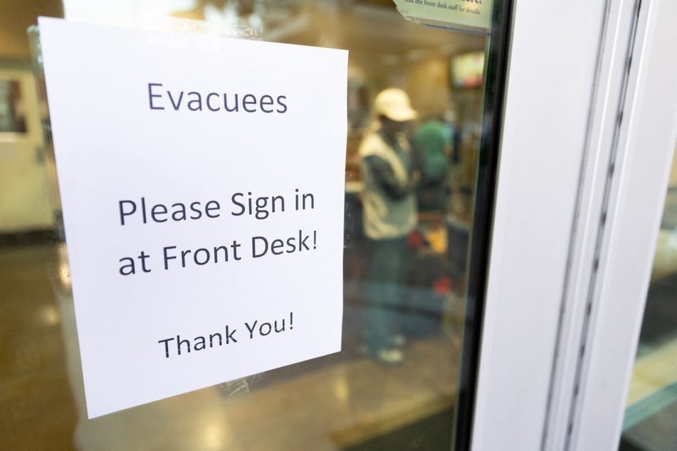 A sign directing evacuees at a recreation center is seen after a chemical leak from a large storage tank threatened residents in Garden Grove, California on Friday.