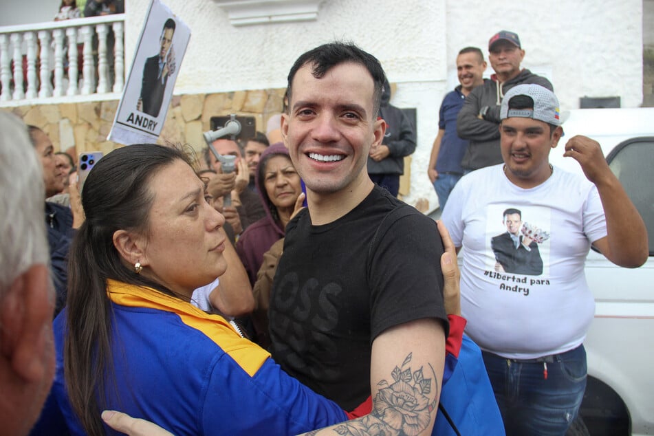 Andry Hernández Romero greets family members in Capacho village, Tachira State, Venezuela, on July 23, 2025, after his release from El Salvador's CECOT megaprison.