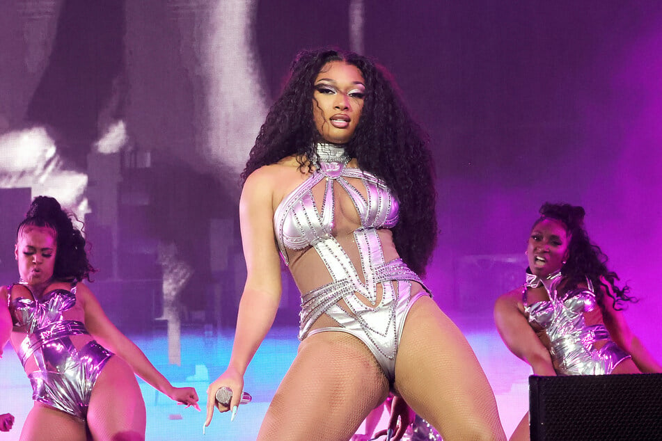 Megan Thee Stallion (c.) stunned at weekend one of Coachella with a star-studded female line-up.