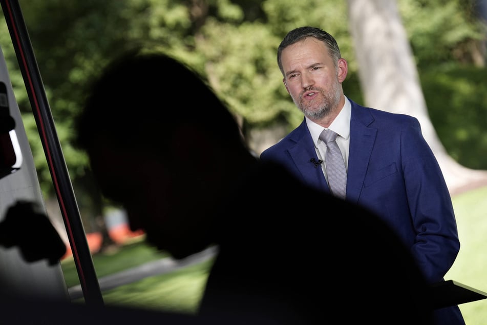 US Trade Representative Jamieson Greer conducts a television interview in August. He said on Friday that he and President Donald Trump are happy with how things are going with Canada.