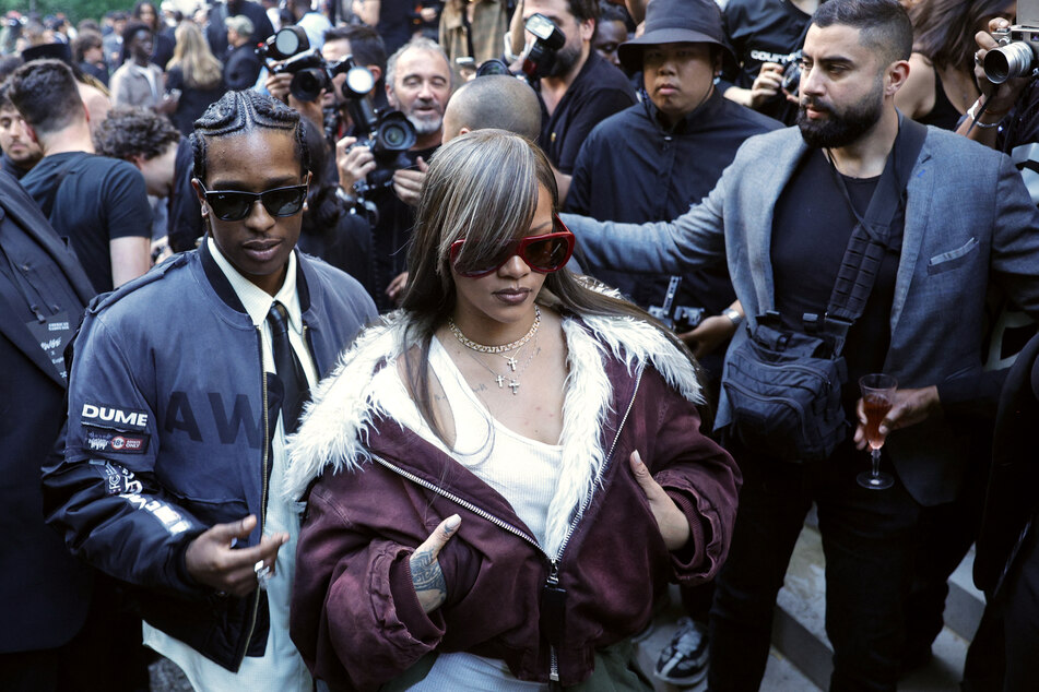 Are Rihanna and A$AP Rocky (l.) planning on adding to their growing family before the rapper's court case?