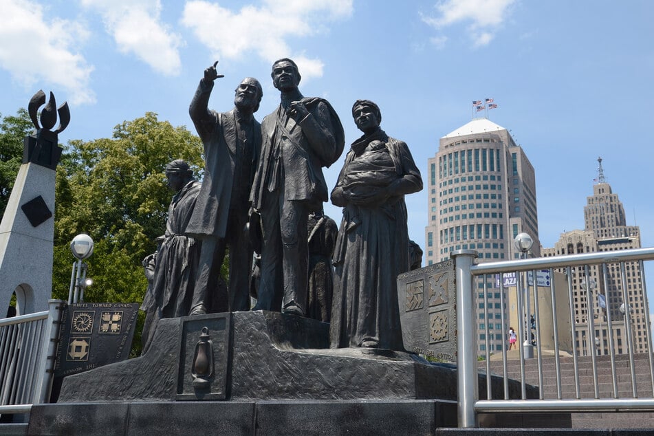 The Gateway to Freedom monument on the waterfront in Detroit honors the city's role in the Underground Railroad.
