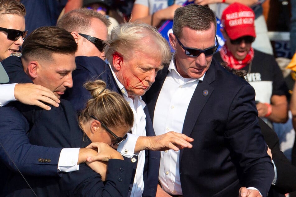 A DHS report has shed new light on the many Secret Service errors that led to Donald Trump (c.) nearly being assassinated at a Pennsylvania rally.