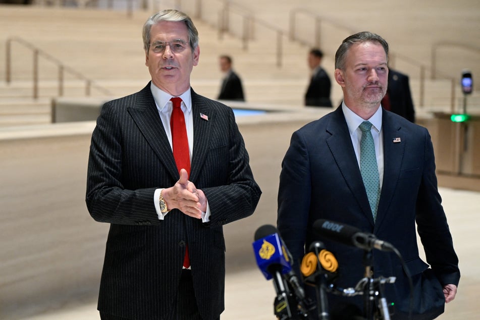 Treasury Secretary Scott Bessent (l.) speaks to the media next to US Trade Representative Jamieson Greer (r.), after meeting China's Vice Premier He Lifeng (not pictured) on September 20, 2026.