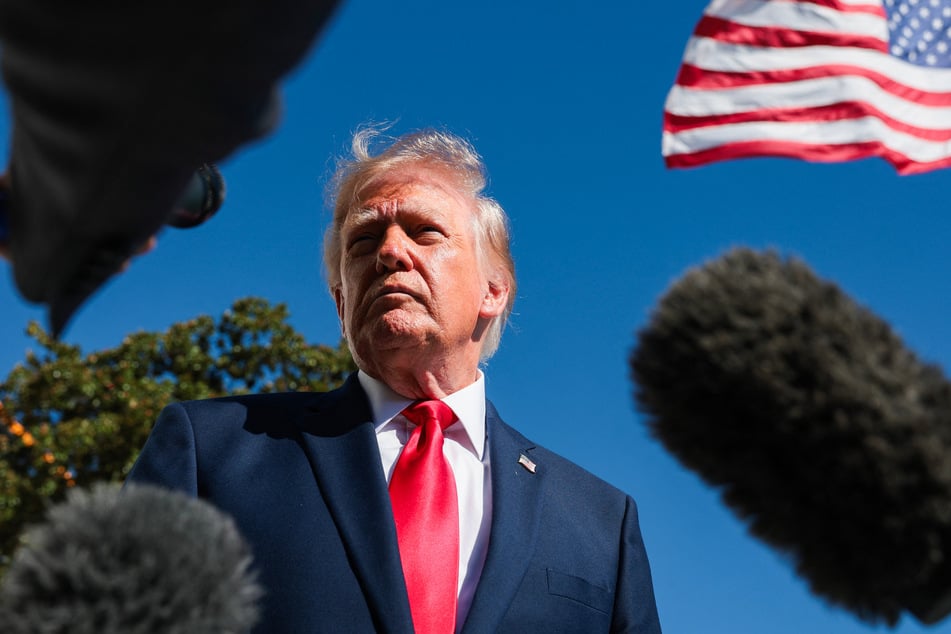 President Donald Trump speaks to reporters before boarding Marine One on the South Lawn of the White House on October 7, 2026. The Trump administration has so far said there are no plans to deploy ICE agents to polling sites.