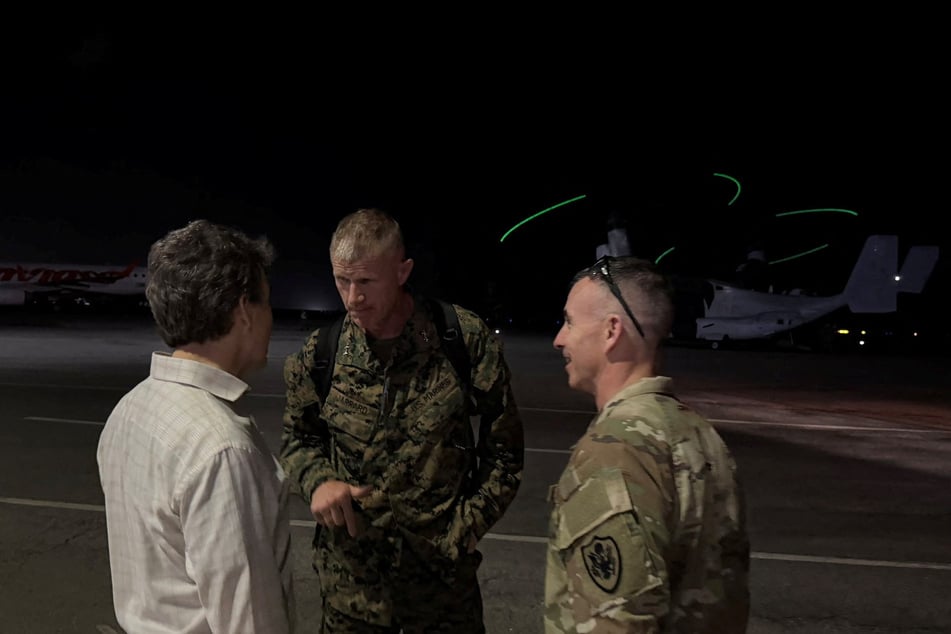 US Marine Corps Major General Kevin Jarrard is welcomed following his arrival in Caracas to oversee the American teams deployed to support relief operations following earthquakes in Venezuela, on June 25, 2026.