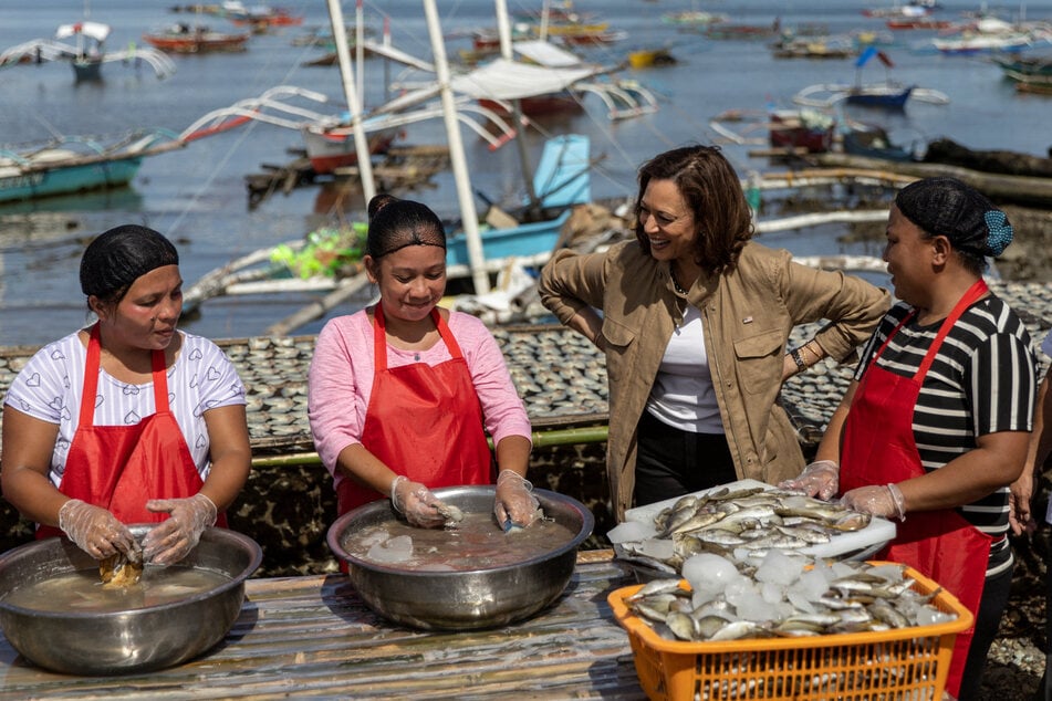Vice President Kamala Harris speaks to locals at Tagburos village.