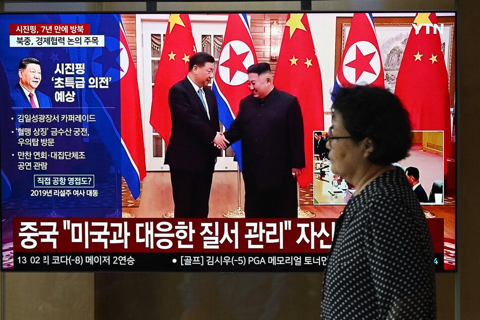 China's Xi hails "invincible friendship" after landing in North Korea for rare visit