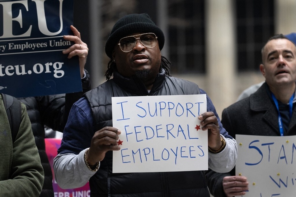 Protesters demonstrate against the mass firing of federal workers in a rally organized by the National Treasury Employees Union in Chicago, Illinois.