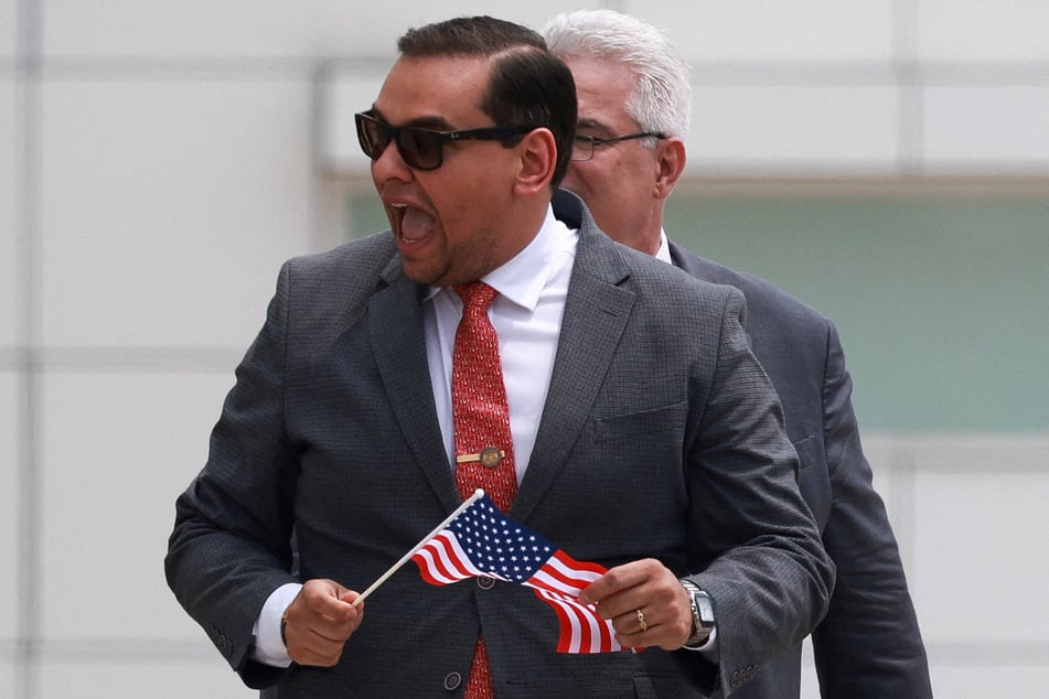 Santos has been indicted on 12 criminal charges, but he maintains his innocence.