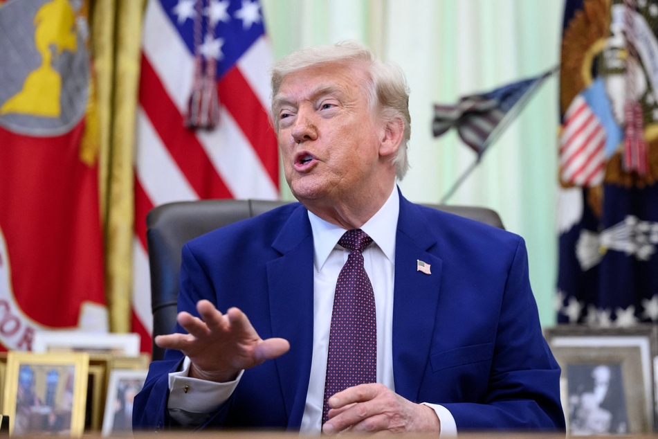 President Donald Trump speaks after signing executive orders in the Oval Office of the White House in Washington, DC on Wednesday.
