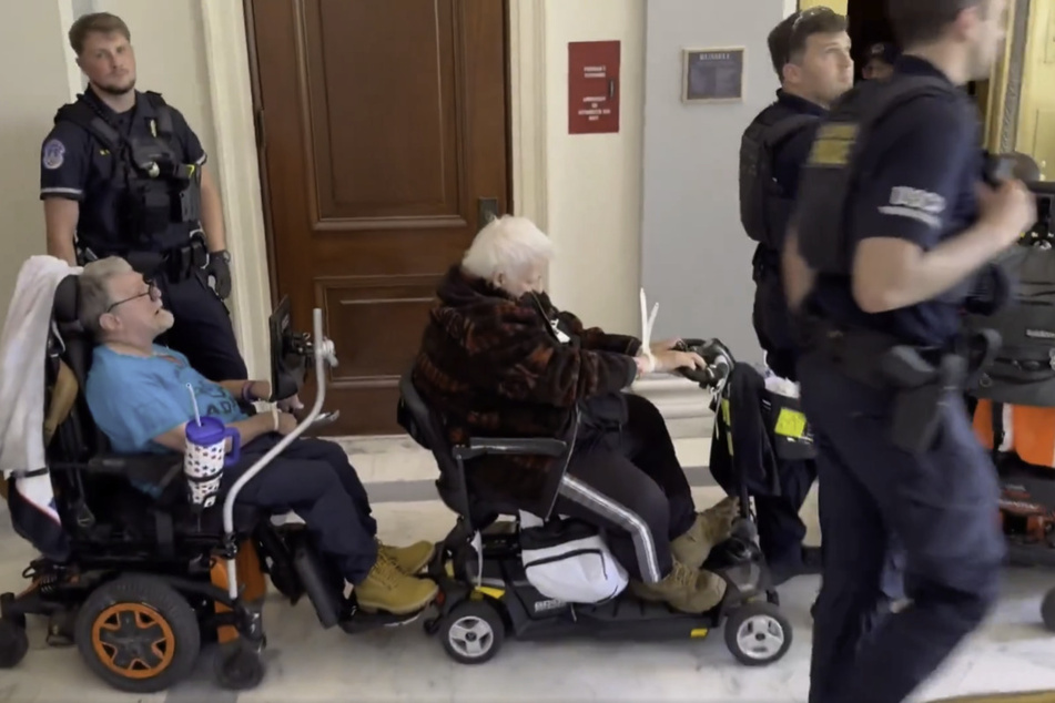 Protesters in wheelchairs arrested on Capitol Hill during rally against cuts to Medicaid