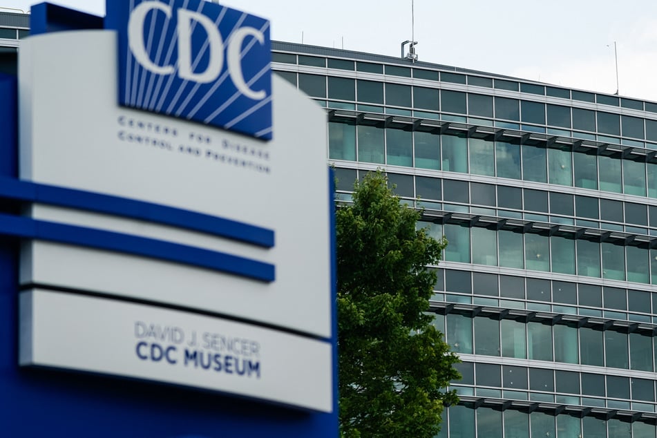 Bullet holes are seen in windows at the Centers for Disease Control headquarters following a shooting that left two dead, on August 9, 2025, in Atlanta, Georgia.