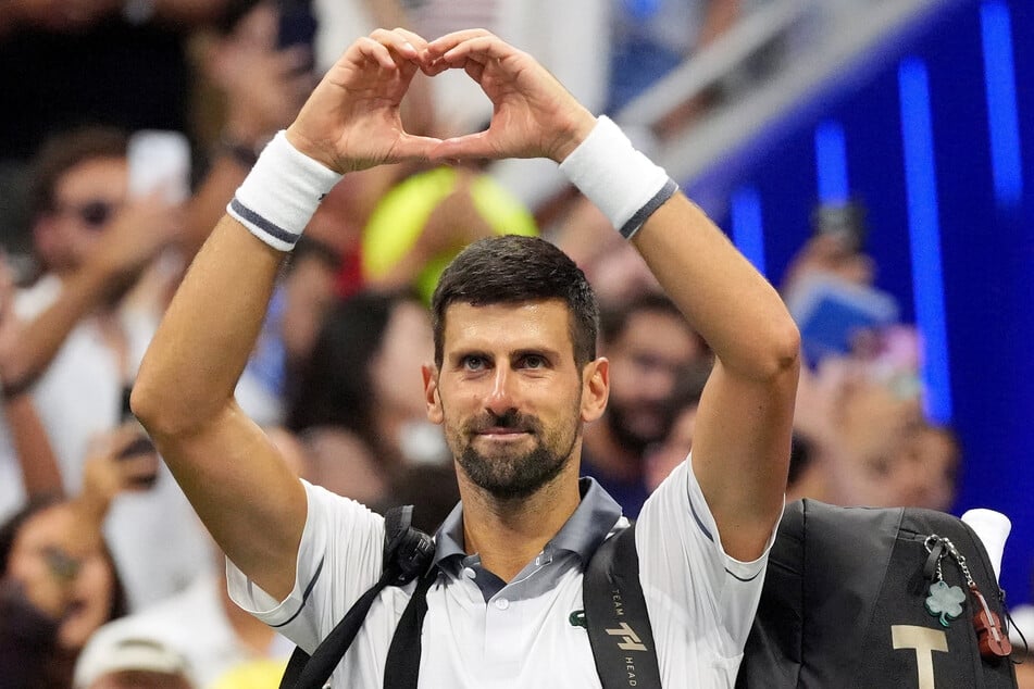Serbia's Novak Djokovic acknowledges the crowd after losing his US Open first round match against Argentina's Mariano Navone on August 30, 2026.