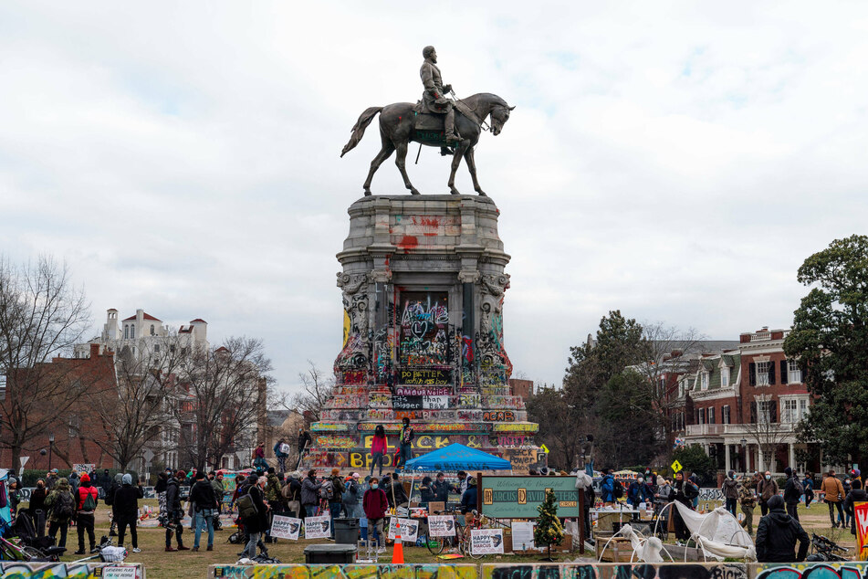 On MLK Day, a crowd gathered around a statue of Confederate General Robert E. Lee, which has been painted, decorated, and reclaimed by Black Lives Matter protestors.