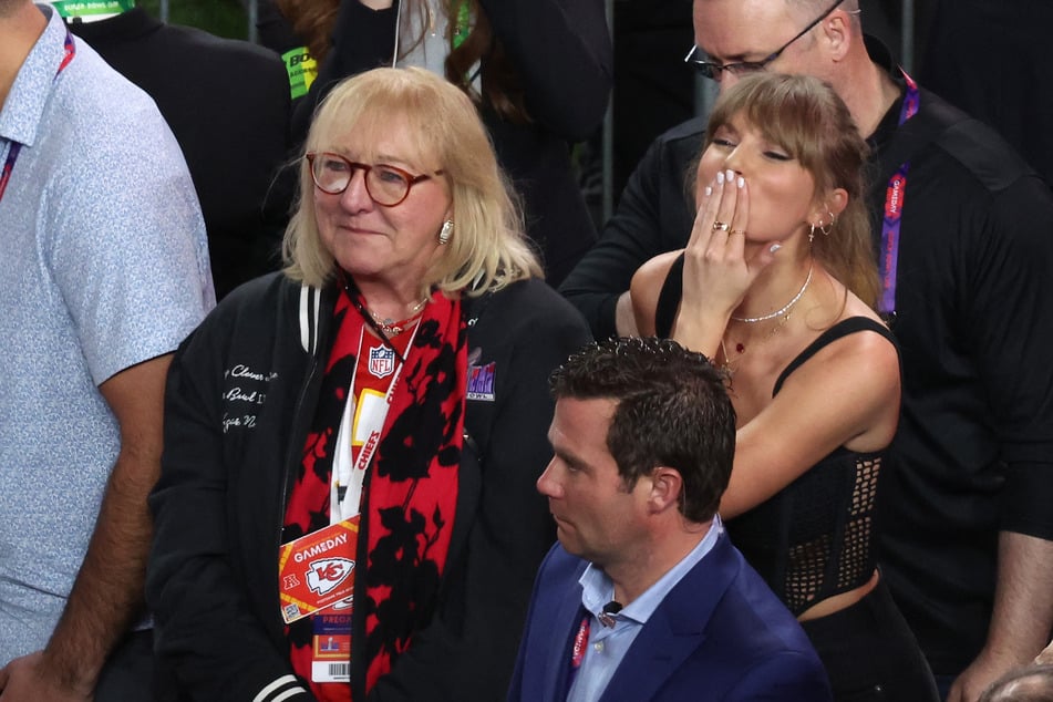 Travis Kelce praised Taylor Swift's (r.) "genuine" attitude at Kansas City Chiefs games, revealing it was one of the reasons he fell for her.