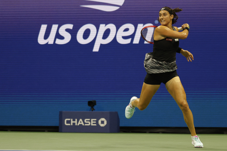 Caroline Garcia of France returns the ball to Coco Gauff of the US on day nine of the 2022 US Open.