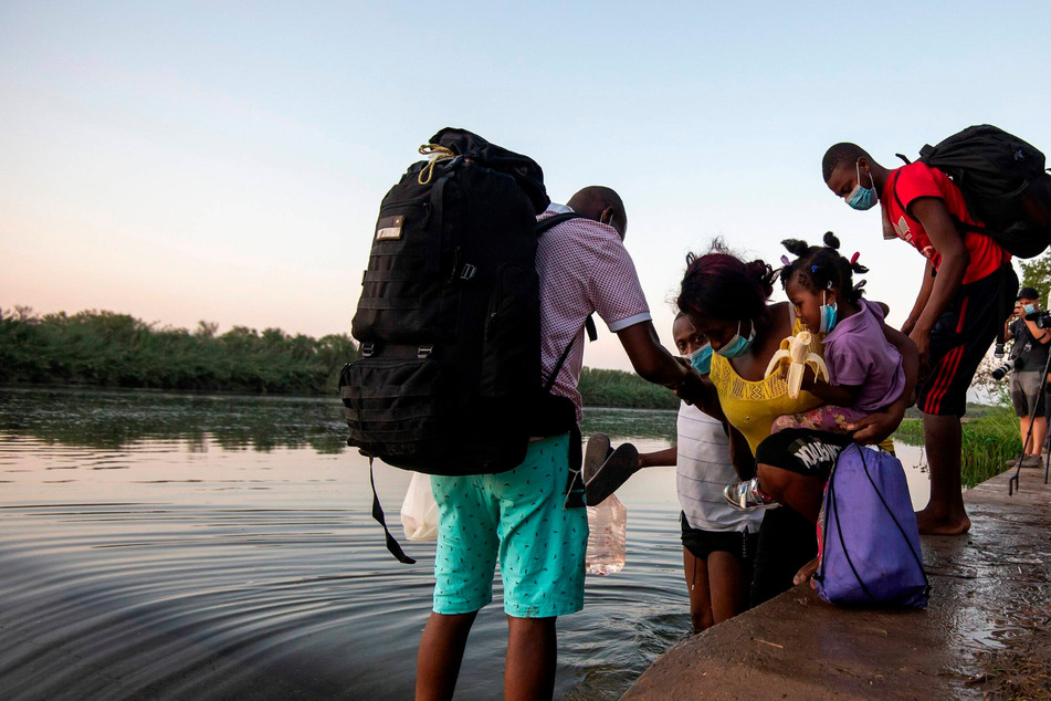 US officials say thousands of Haitians are being released, despite ongoing mass deportation flights