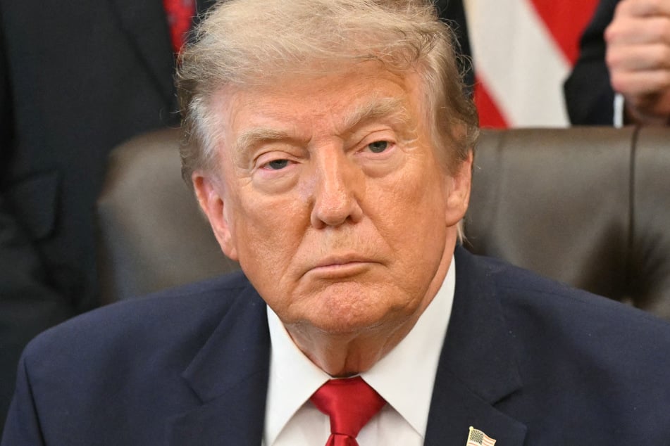 Trump has back down a threatened levy on ships passing through the Strait of Hormuz.
