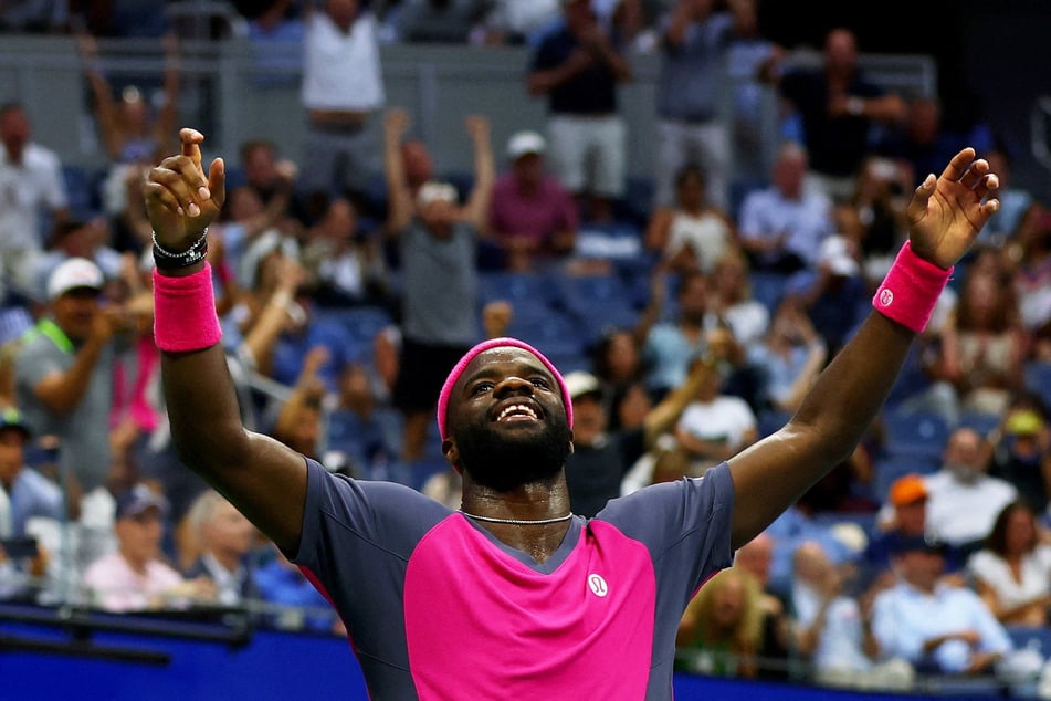Frances Tiafoe celebrates winning his US Open quarter-final match against Alex Michelsen on September 8, 2026.