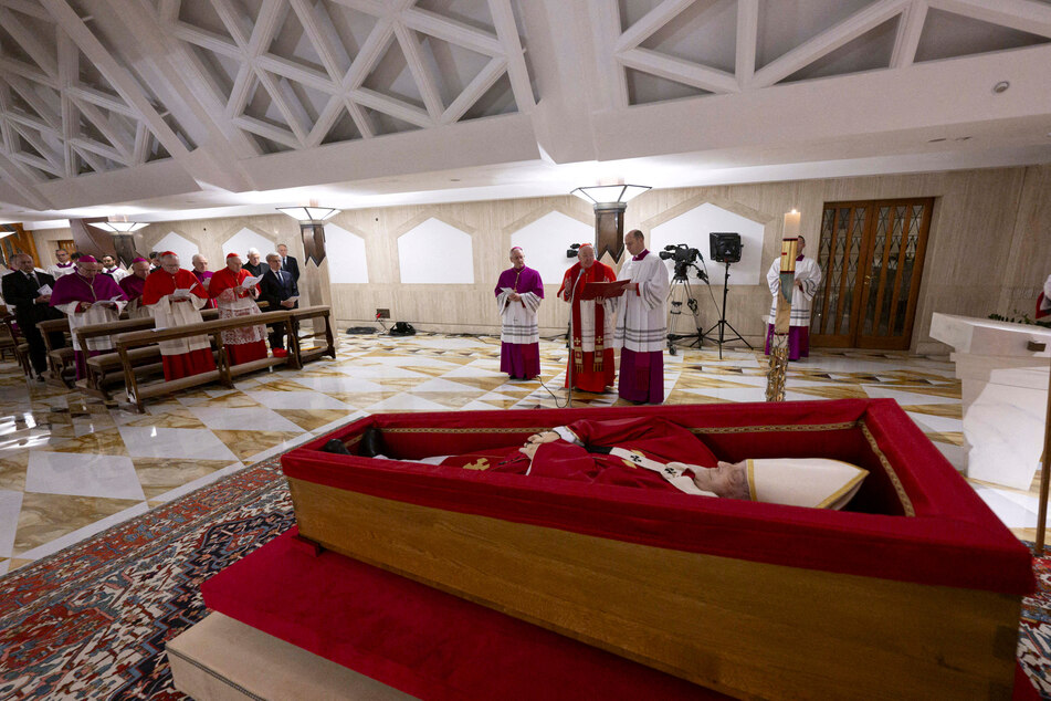 The body of Pope Francis is placed in an open casket during the rite of the declaration of death in Santa Marta residence at the Vatican.