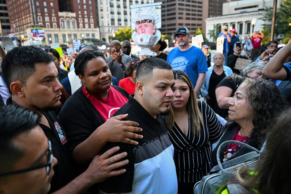 Salvadoran migrant and US resident Kilmar Abrego Garcia walks with his wife Jennifer Vasquez as he arrives at a US Immigration and Customs Enforcement (ICE) field office in Baltimore, Maryland, on Monday.
