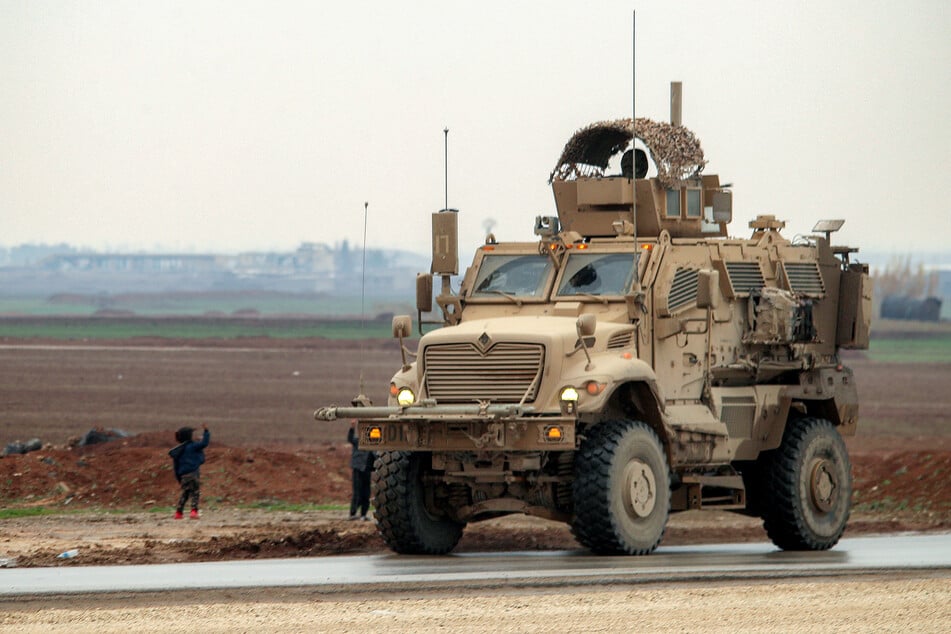 US military says they struck over 30 Islamic State group targets in Syria
