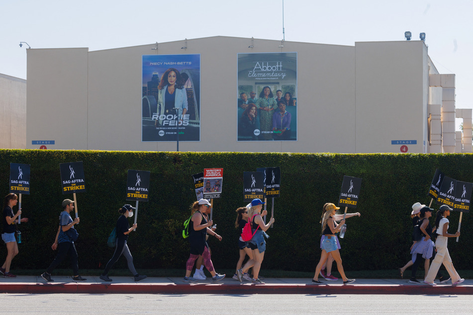 The Screen Actors Guild (SAG-AFTRA) and the Writers Guild of America (WGA) are striking for better conditions and protections against AI.