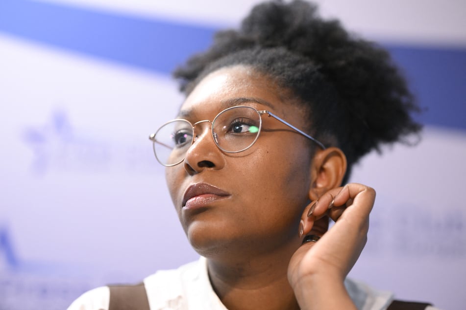 Yema Lumumba participates in a press conference following a hearing before a Belgian court to weigh prosecuting the sole surviving suspect in the 1961 killing of Patrice Lumumba, in Brussels on January 19, 2026.