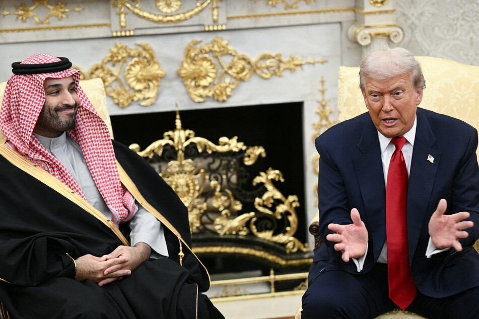 President Donald Trump (r.) defended Saudi Crown Prince Mohammed bin Salman over the 2018 murder of a US-based journalist by Saudi agents.